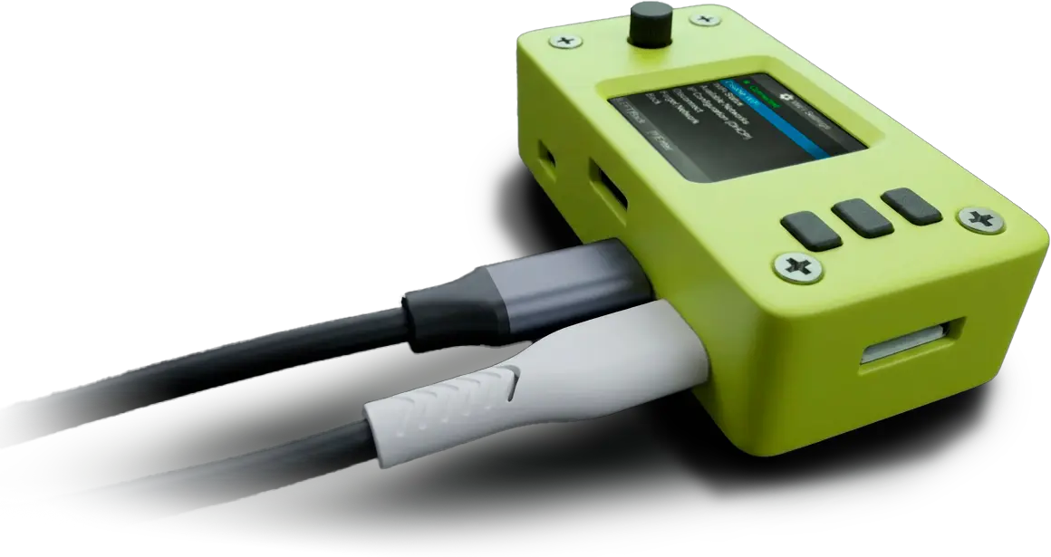 USBridge out-of-band management device shown connected via USB-C and standard USB cables, featuring a small built-in display and physical control buttons.